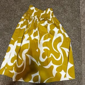 Mustard colored skirt with pockets. Originally from Target. Never worn.